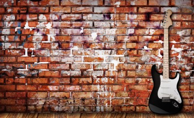 guitar-on-brick-wall